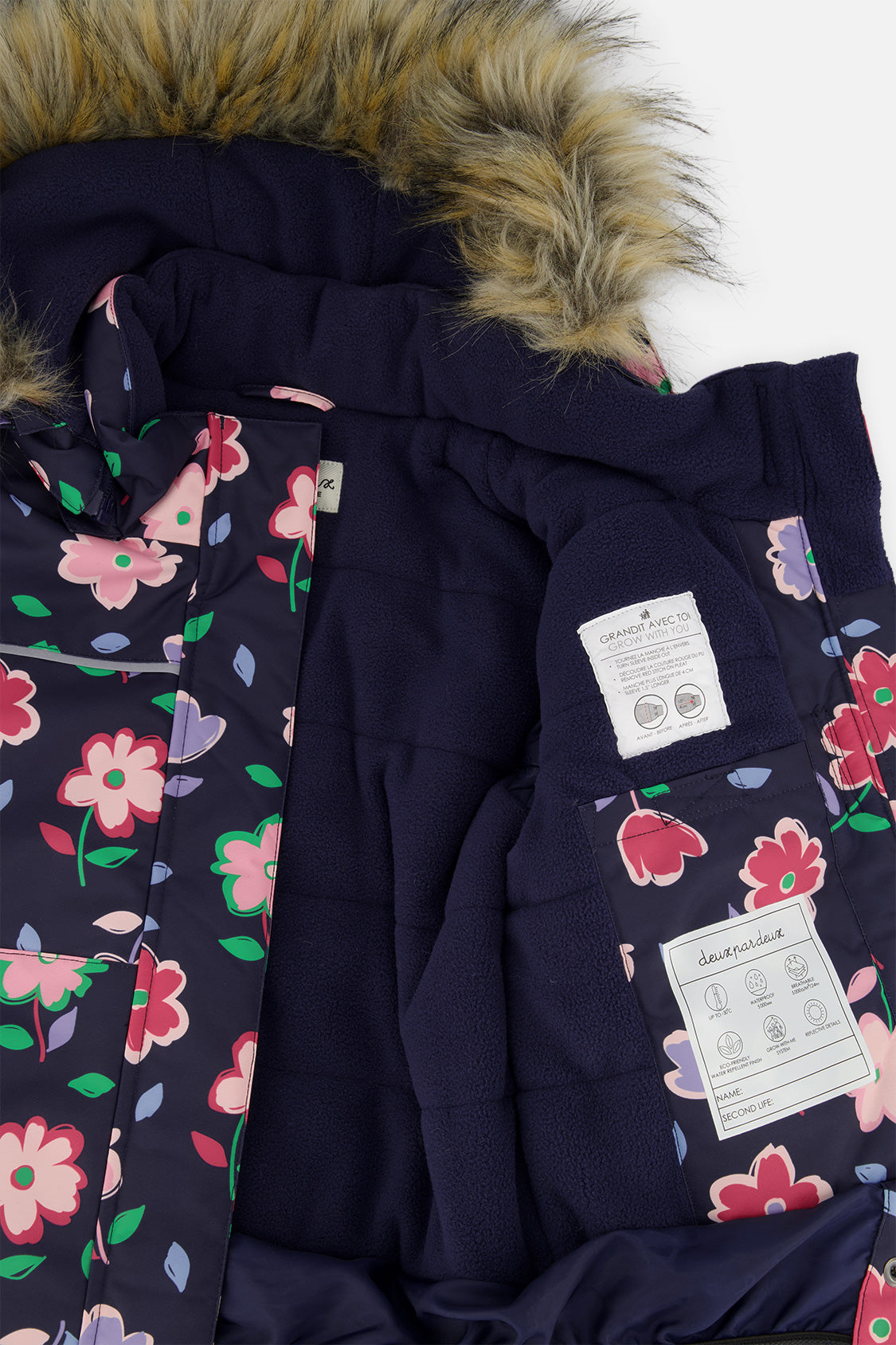 Deux par Deux navy floral DISCOVER jacket opened to show the navy fleece lining