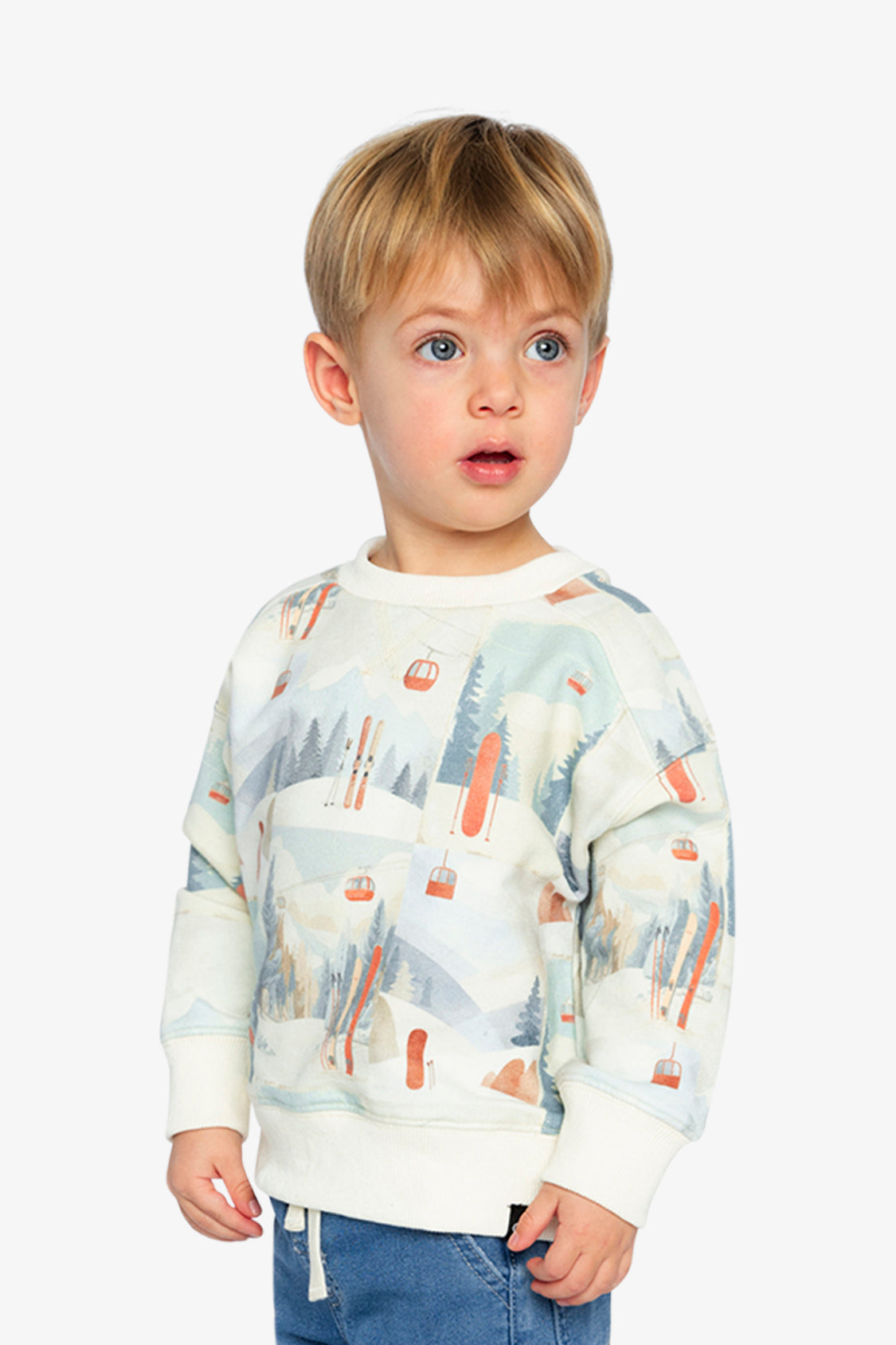 Child in the Deux par Deux beige ski print sweatshirt, Nordic Buddies lookbook