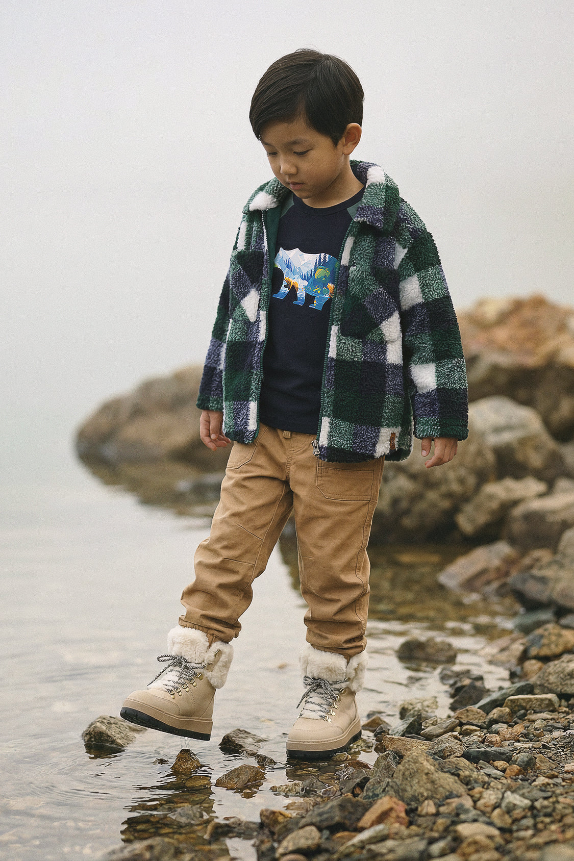 Child wearing the Deux par Deux blue and green check zipped overshirt, lifestyle view