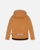 Back view of Teknik snowsuit showing adjustable hems and suspenders