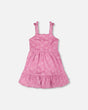 Front flat lay of pink Deux par Deux girl beach cover-up dress with tiered skirt