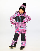 Child wearing Deux par Deux multicolor leopard & zebra snowsuit outdoors – shop now