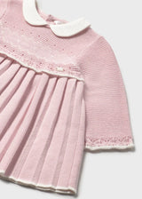 Close-up of jacquard fabric and baby collar on Mayoral dress