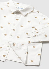 Close-up of printed pattern and buttons on Mayoral baby shirt