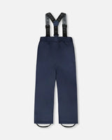 Detail of fleece-lined hood and waterproof zippers on Deux par Deux navy blue jacket