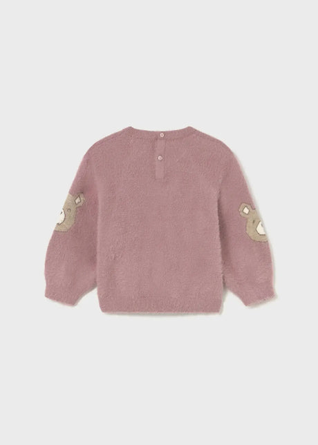 Flat lay back view showing button closure