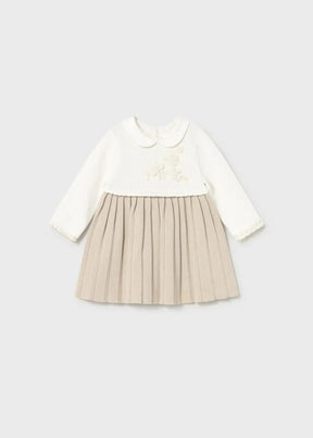 Flat lay front view of Mayoral baby knit dress