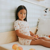 Floral print organic cotton kids pajama set close-up Petit Lem