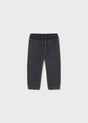 Front flat lay of Mayoral baby cotton-twill joggers in black with elastic waistband and cuffed hems