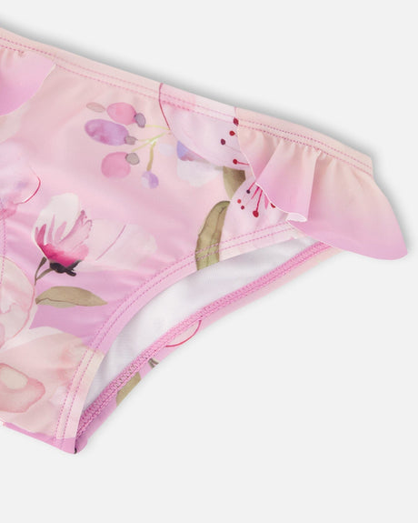 Close-up of the ruffled edge on the purple flower swim bottoms
