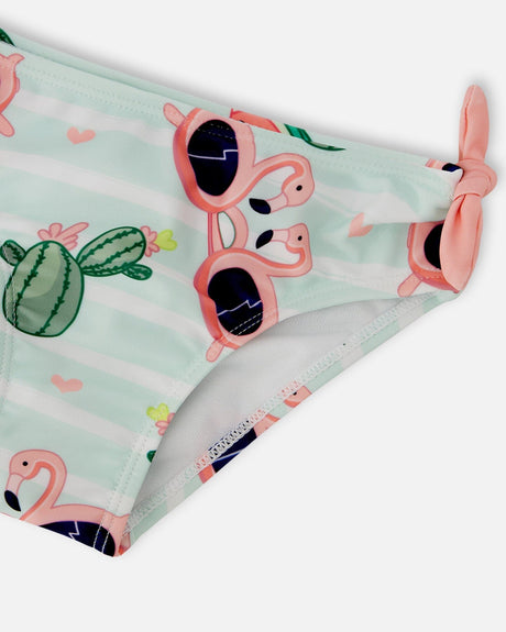 Close-up of the flamingo print bikini bottom with a bow at the side
