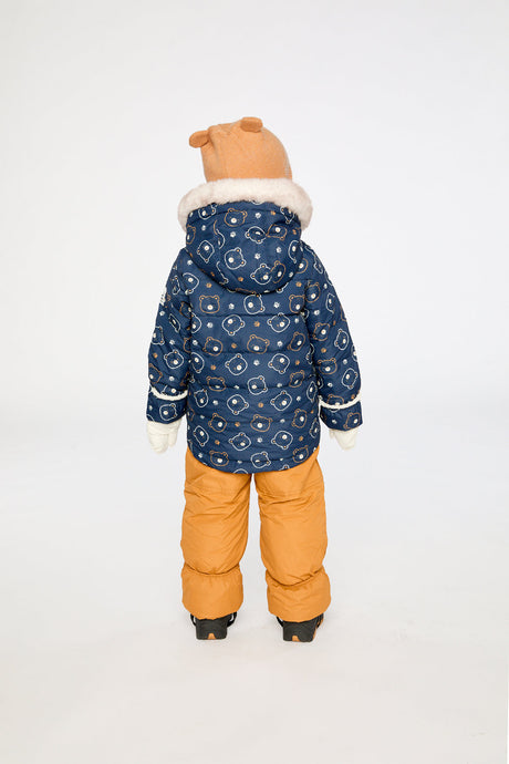 Child wearing the Deux par Deux teddy bear print snowsuit, third lookbook photo