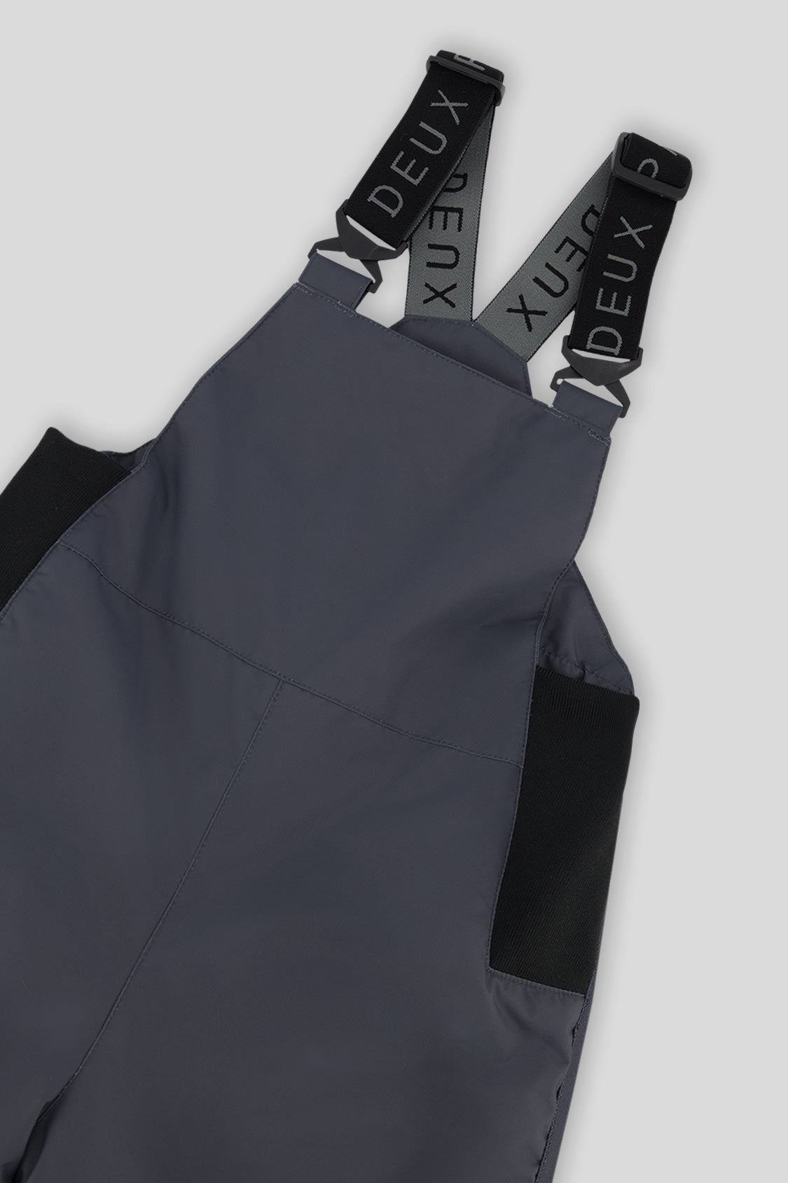 Close-up of the Deux par Deux DISCOVER dark grey bib and suspenders