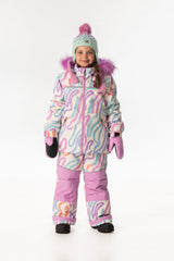 Girl wearing the multicolored line-print DISCOVER jacket with orchid knee-panel ski pants and a mint pom-pom hat, front view