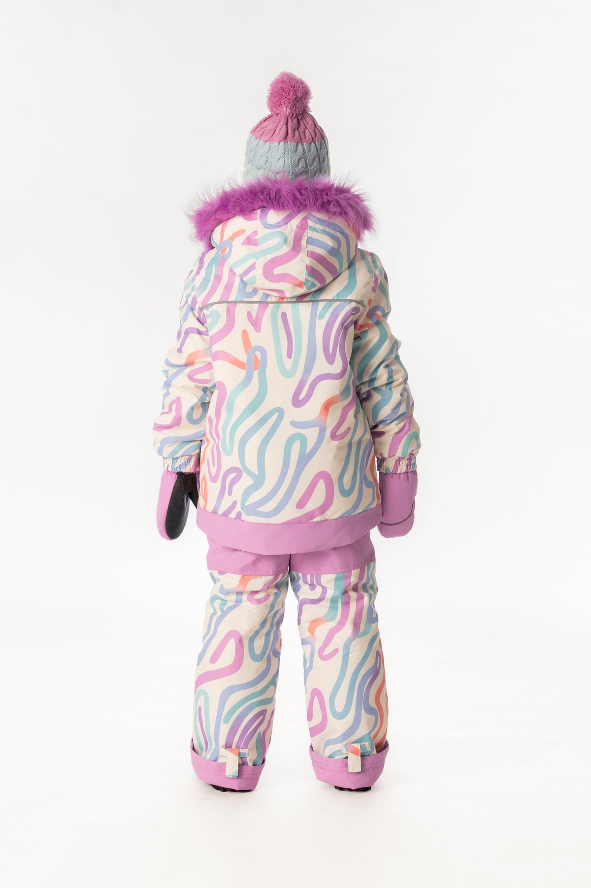 Child wearing the multicolored line print Deux par Deux DISCOVER snowsuit, back view