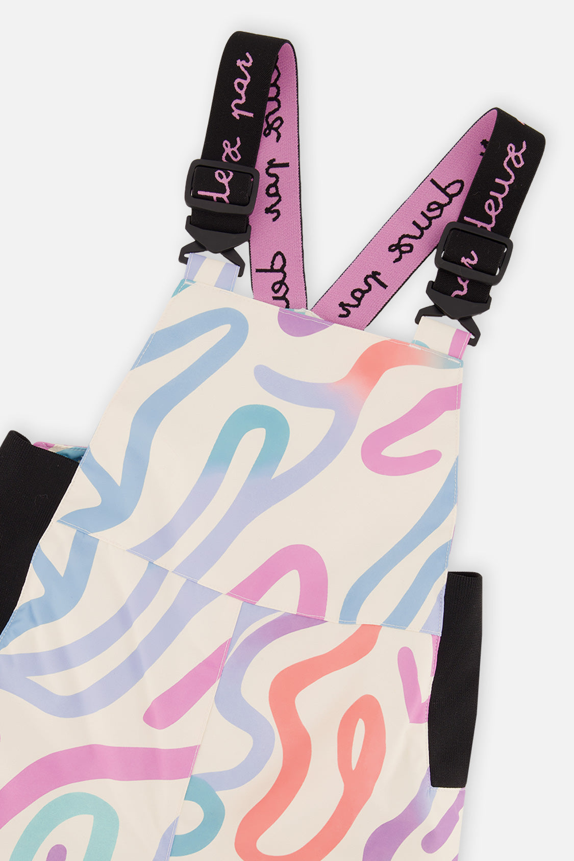 Close-up of the line print bib with Deux par Deux suspenders and buckles