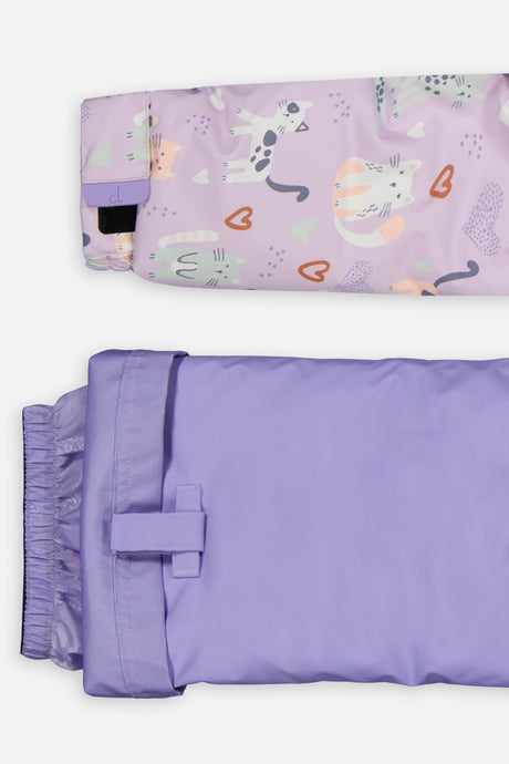 Close-up of the purple cat print DISCOVER jacket cuff and the adjustable lavender pant hem
