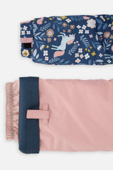 Close-up of the unicorn print DISCOVER jacket cuff and the adjustable pink pant hem