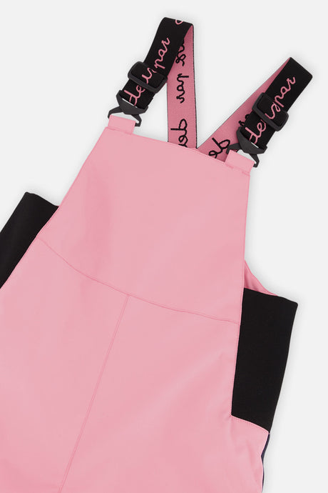 Close-up of the Deux par Deux pink DISCOVER bib and suspenders