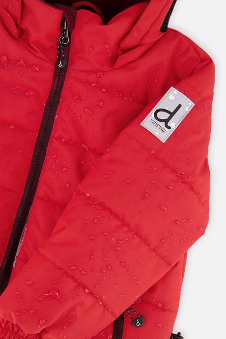 Deux par Deux boys PLAY snowsuit, red and black – close-up of the water-repellent jacket shell and logo patch