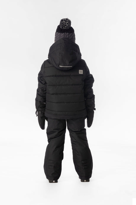 Boy in the all-black Deux par Deux PLAY snowsuit, back view