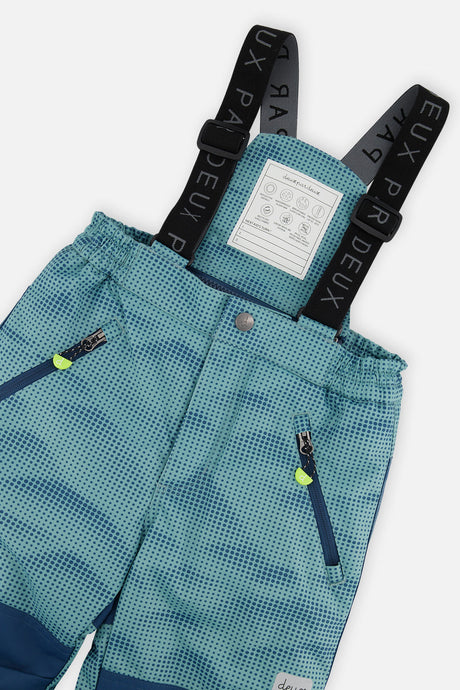 Close-up of the Deux par Deux greyish blue PLAY snow pants suspenders and zippered pockets