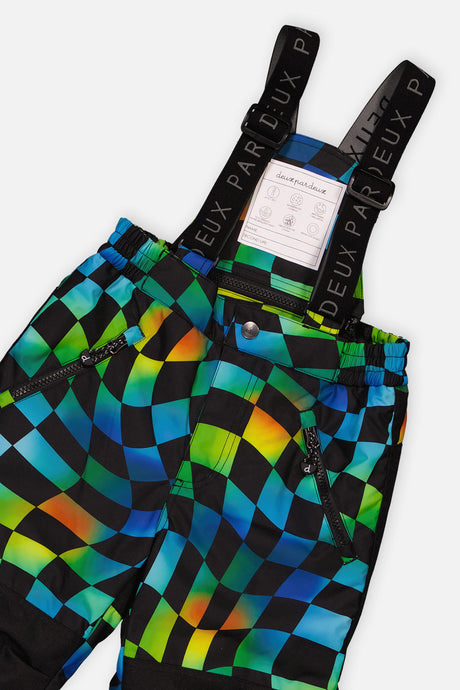 Close-up of the checkerboard snow pants waist, suspenders and zippered pocket