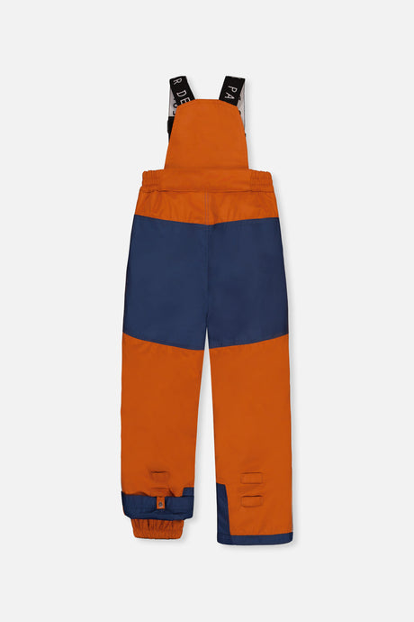 Rust PLAY bib snow pants with navy reinforced seat, back view