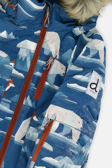 Close-up of the polar bear print, rust front zipper and sleeve logo patch