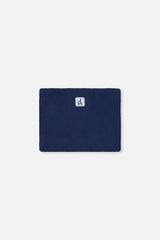 Navy polar fleece neckwarmer included with the Deux par Deux checkered PLAY snowsuit