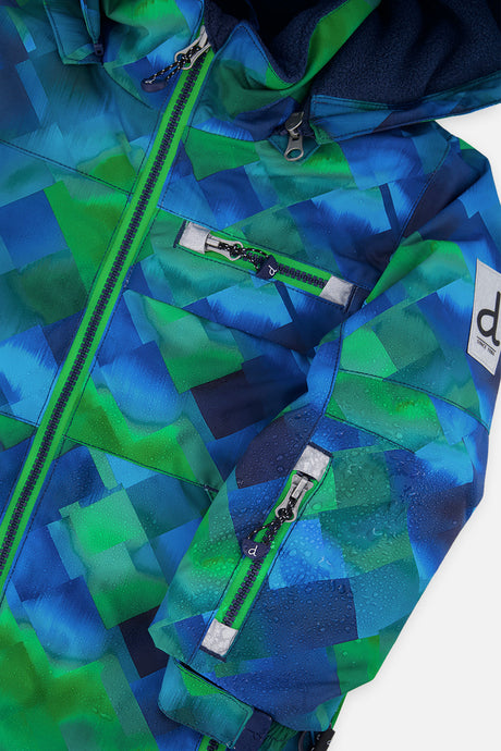 Close-up of the checkered PLAY jacket front zipper, chest pocket and sleeve logo patch