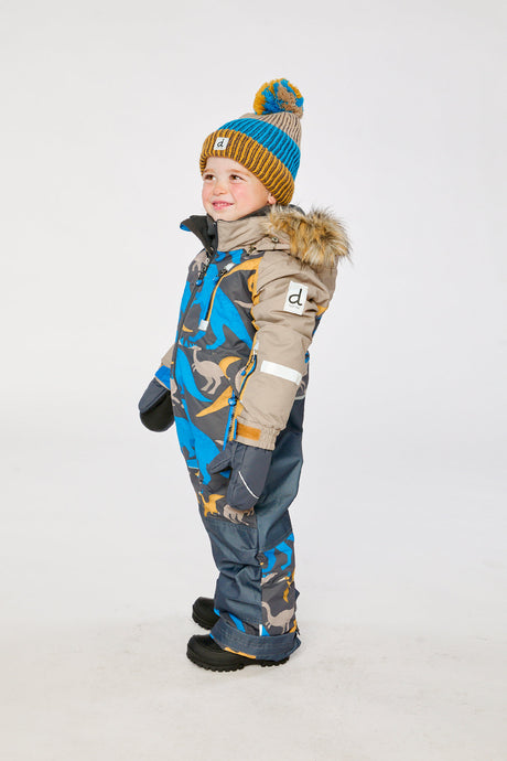 Child wearing the Deux par Deux grey and blue dinosaur PLAY one-piece snowsuit, side view