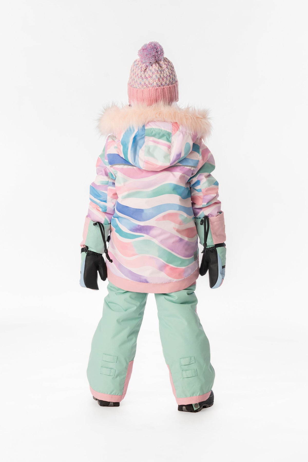 Child wearing the multicolor line print Deux par Deux PLAY snowsuit, back view