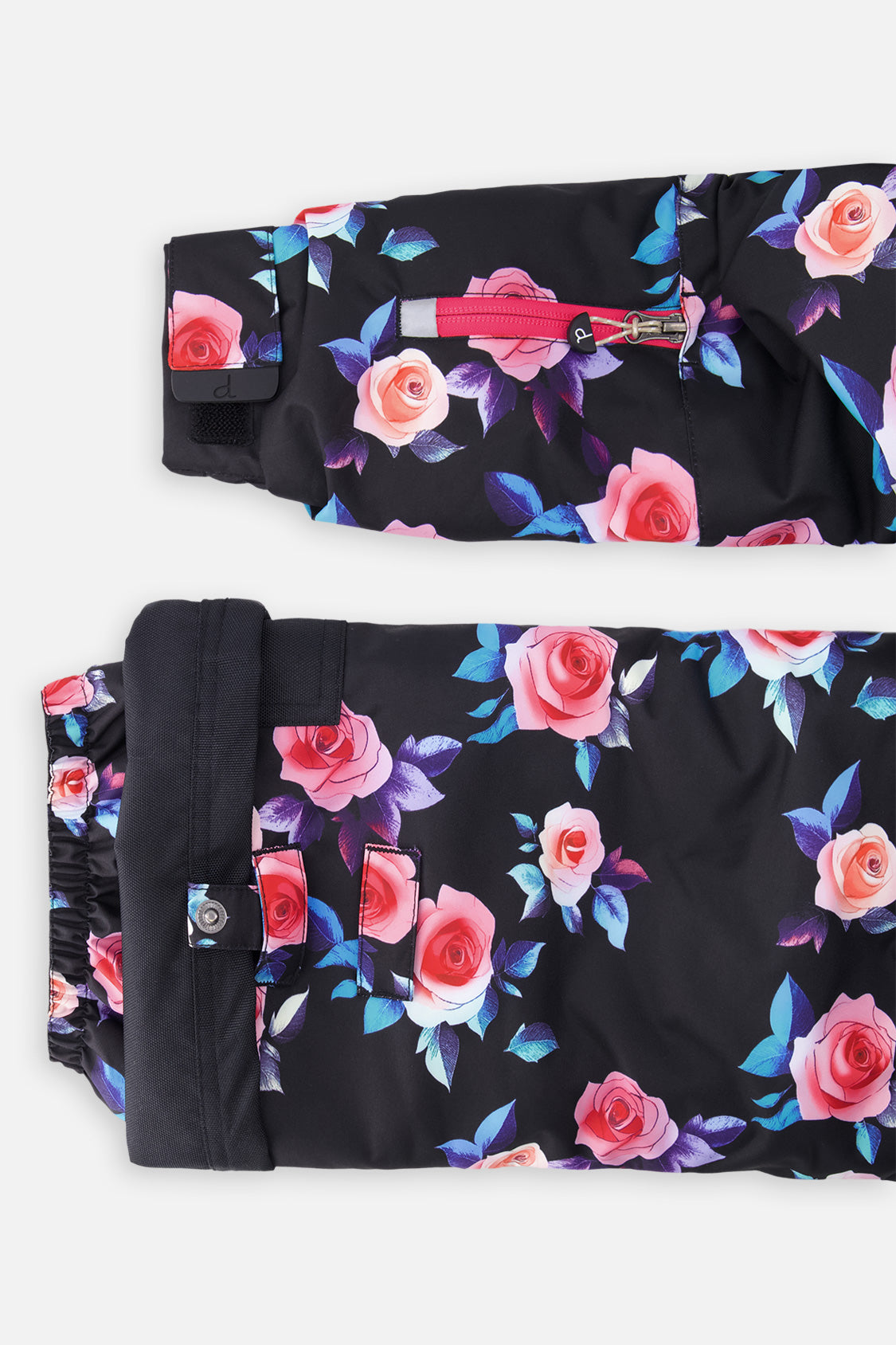 Deux par Deux girls' PLAY two-piece snowsuit in black rose print, alternate studio shot