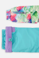 Deux par Deux girls' PLAY snowsuit with diamond-print jacket and turquoise and purple pants, alternate studio shot