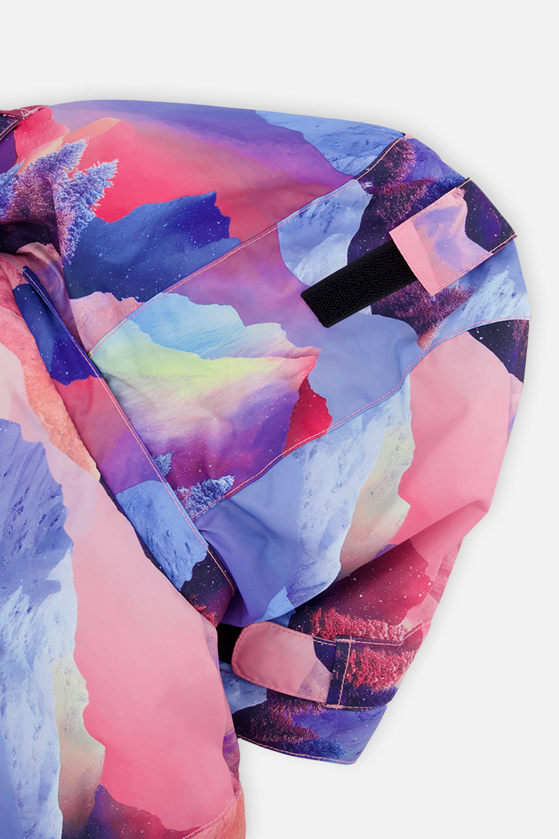Deux par Deux girls' PLAY snowsuit with pink mountain-print jacket and blue snow pants, further studio view