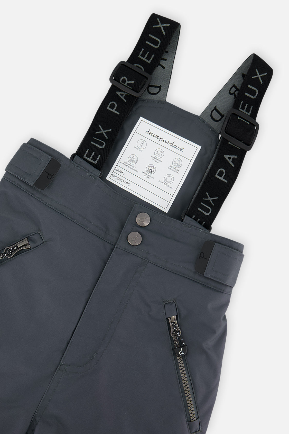 Close-up of the cool dark grey Deux par Deux PLAY snow pants waist, zippered pockets and suspenders