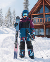 Deux par Deux boys' TEKNIK two-piece snowsuit in blue and red camouflage – lifestyle photo