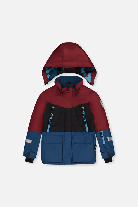 Deux par Deux boys' TEKNIK two-piece snowsuit in blue and red camouflage – back view