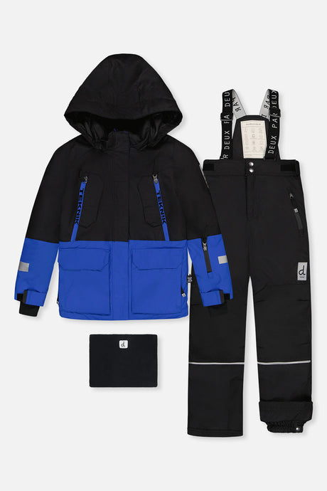 Deux par Deux boys' Teknik two-piece snowsuit in black and royal blue – jacket, snow pants and neck warmer, front view