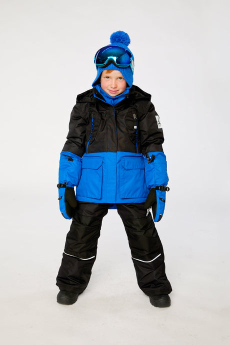 Deux par Deux boys' Teknik two-piece snowsuit in black and royal blue – worn by a child model, full length