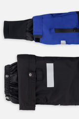 Deux par Deux boys' Teknik two-piece snowsuit in black and royal blue – sleeve cuff and pant hem details