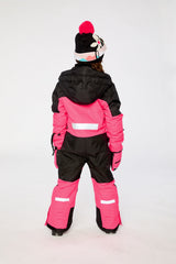 Child wearing the bright pink Deux par Deux Teknik one-piece snowsuit, lookbook photo 3
