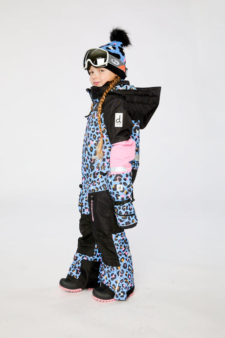 Deux par Deux girls' TEKNIK one-piece snowsuit in blue leopard print – worn by a model, view 3