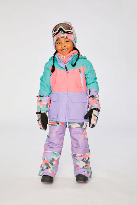 Deux par Deux girls' Teknik snowsuit, turquoise-orange-mauve color-block jacket, camo pants – worn by a child model, full length