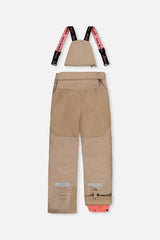 Back of the taupe snow pants with suspenders and reinforced seat