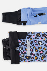 Close-up of the TEKNIK jacket cuff and the adjustable snow pant hem with snap tab