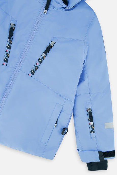 Close-up of the chest zip pockets and sleeve on the blue-violet TEKNIK jacket