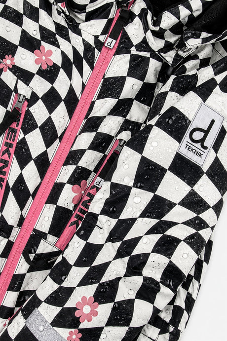 Water beading on the checkered TEKNIK jacket beside the pink zipper and logo patch