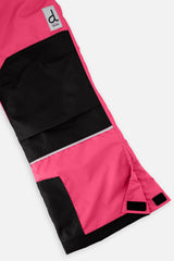 Close-up of the bright pink snow pants leg with black reinforced knee